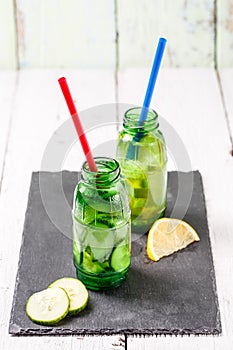 Two botle of infused detox diet refreshing waters: with cucumber and lemon