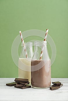 Two bottles chocolate and vanila milk photo