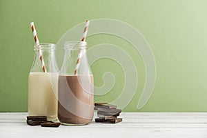 Two bottles chocolate and vanila milk photo