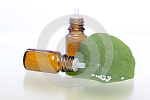 Two bottles with homeopathy globules