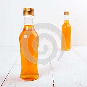 Two Bottles Of Syrup