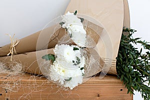 Two bouquets of white chrysanthemums