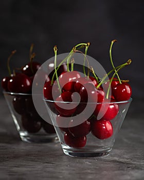 Two bowl of sweet cherry