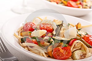 Two bowls of Mediterranean pasta