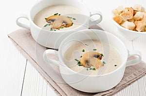 Two bowls of mushroom cream soup
