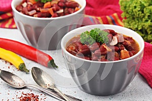 Two bowls with traditional Georgian dish - lobio