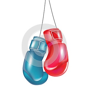 Two boxing gloves hanging