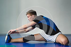 Two boxing men exercising together at the health club