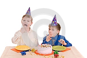 Two boy wich cake