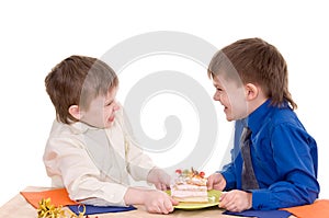 Two boys with cake