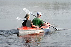 Two boys in a canoe photo