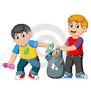 Two boys collecting Rubbish