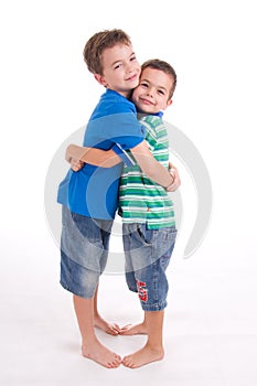 Two boys hugging