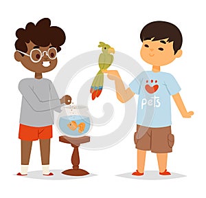 Two boys with pet goldfish and parrot. One feeds fish in bowl, other holds a green parrot. Children with pets and animal