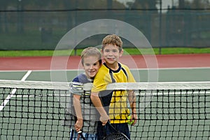 Two Boys Playing Tennis