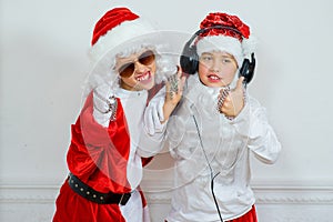 Two boys pretending he is a Bad Santa