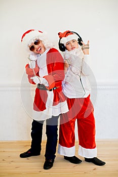 Two boys pretending he is a Bad Santa