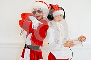 Two boys pretending he is a Bad Santa