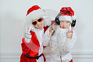 Two boys pretending he is a Bad Santa