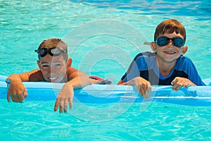 Two boys in the swimming pool 1