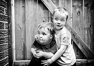 Two Boys Together Looking Up - Black and White