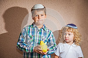 Two boys in yarmulkes