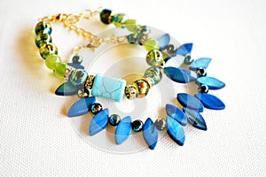 two bracelets on a white surface