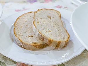 Two breads on white plate ready to eat
