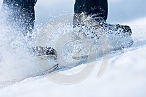 Two breaking ice skates with flying