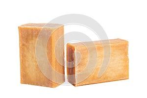 Two brick of brown common soap