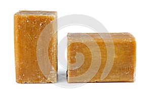 Two bricks of brown common soap