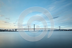 Two bridges against the blue sky