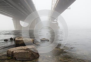 Two bridges in a fog