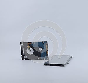 two broken laptop hard drives isolated on a white background