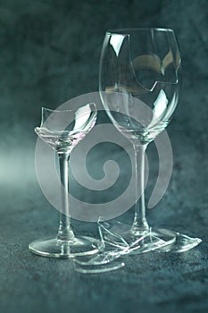 Two broken wine glasses