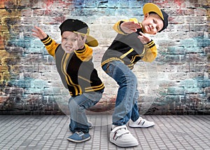 Two brothers dancing break dance.Hip-hop style.The cool kids.