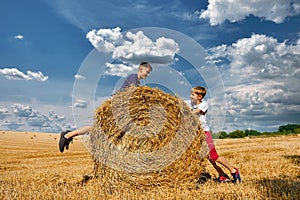 Two brothers are fooling around and laughing.