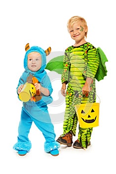 Two brothers in monster costumes on Halloween