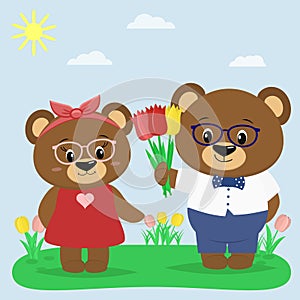 Two brown bears in glasses and clothes in a summer glade. A boy gives tulips to a girl.