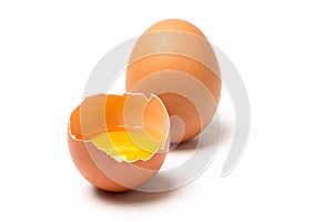 Two brown eggs on white background