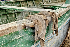 Fishing Boat Hull With Rags photo