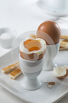 Two brown soft-boiled eggs for breakfast