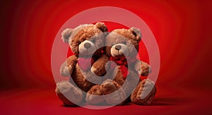 two brown teddy bears are wearing red bowties against a red background