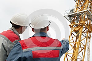 Two builders at construction site