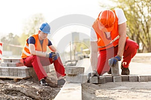 Two builders on construction site