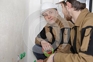 Two builders discussing project