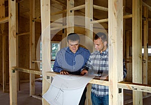 Two builders in a new build house