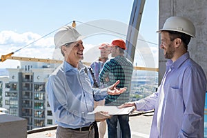 Two Building Business Men On Construction Site Meeting Signing Contract Happy Smiling