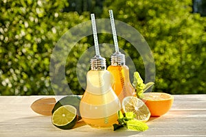 Summer healthy non alcoholic cocktails, citrus infused water drinks, lemonades with lime lemon or orange, diet detox beverages.