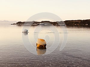 Two buoys at Loe Beach